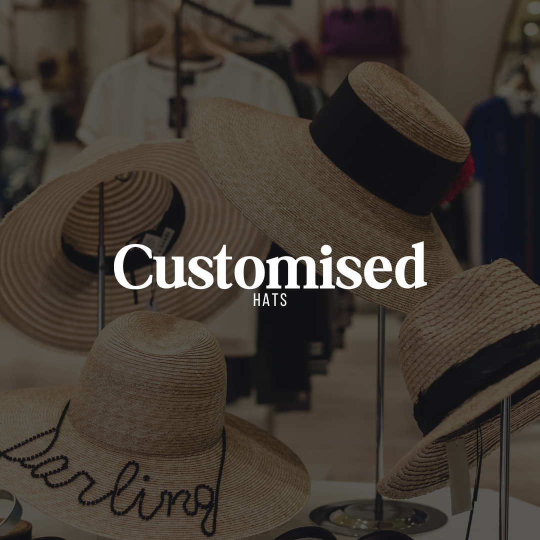 Customised straw hats on display featuring wide-brim styles with embroidered words and ribbon accents – Miss Mafia personalised fashion accessories