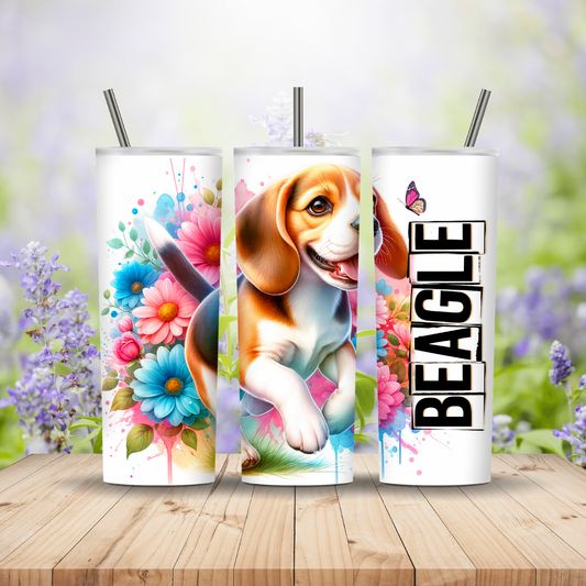 Three tumblers with dog-themed designs on a wooden surface with a blurred floral background Miss Mafia