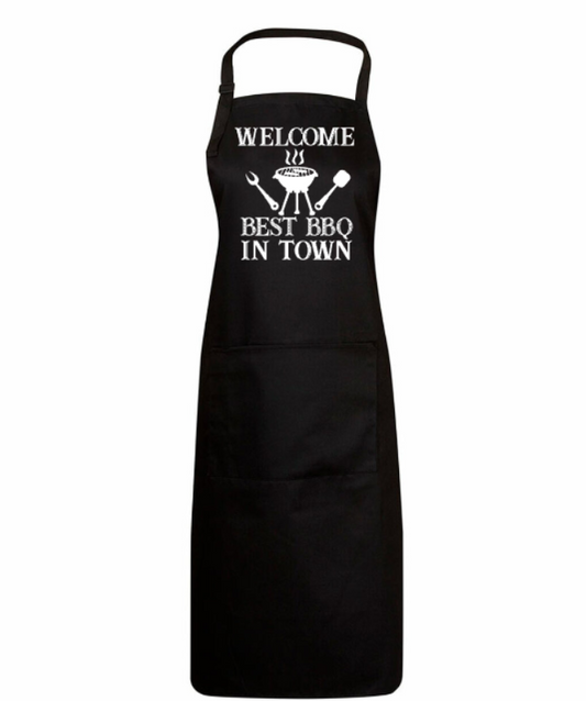 Black apron with 'Welcome to the Best BBQ in Town' text on a white background