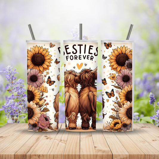 Three sunflower-themed tumblers with 'Besties Forever' text on a wooden surface with a floral background.