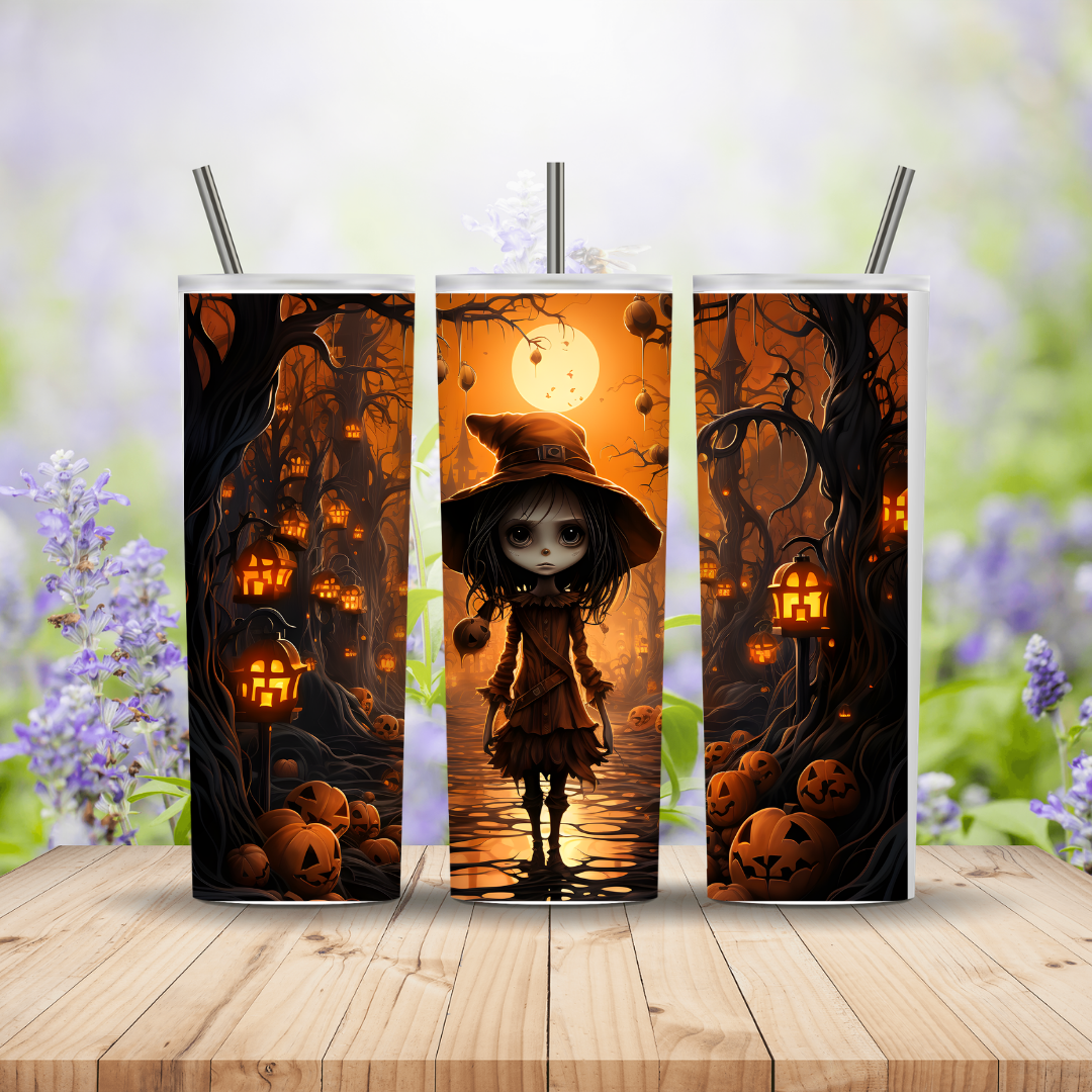 Three Halloween-themed tumblers with a witch and pumpkins design on a wooden surface.