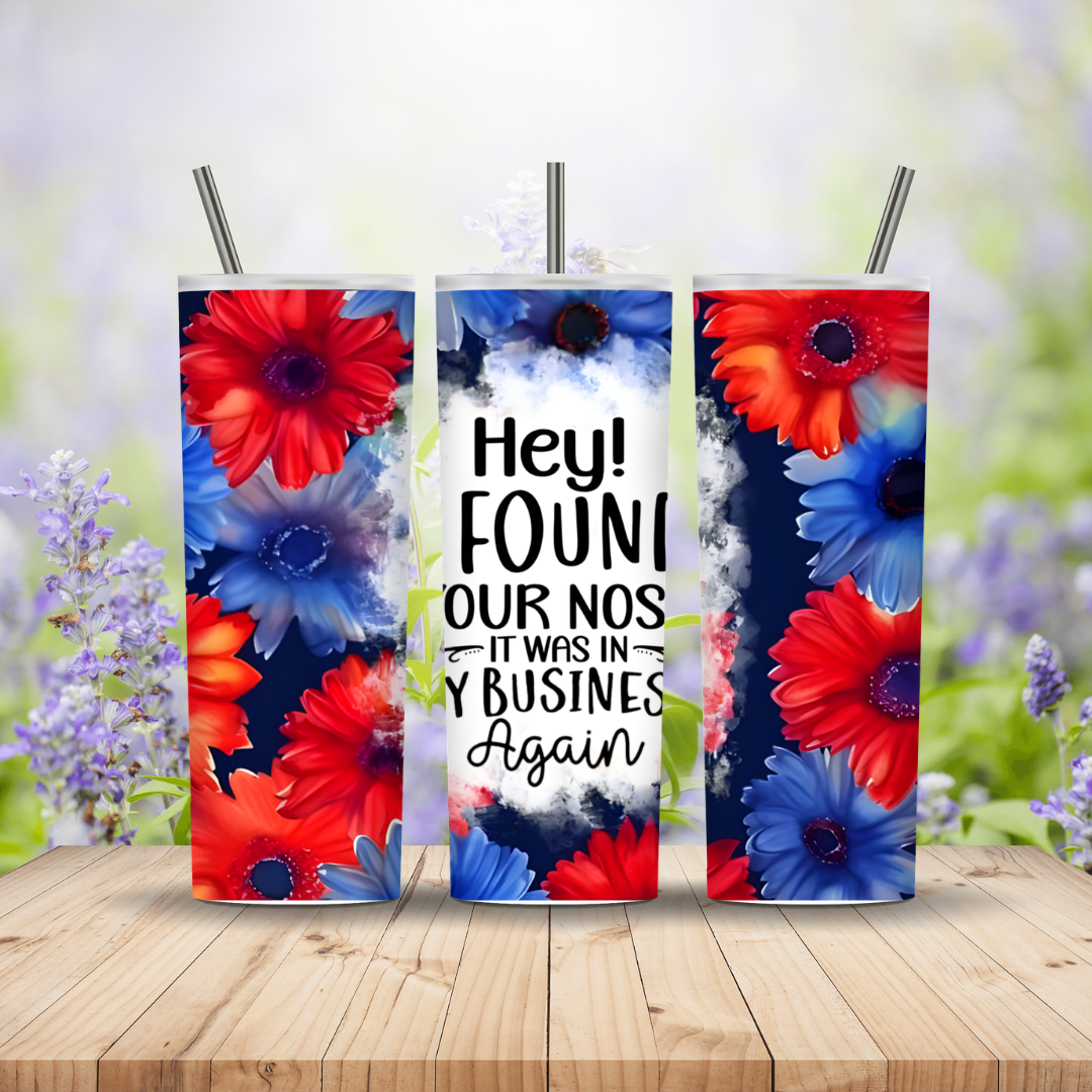 floral three tumblers on a wooden background