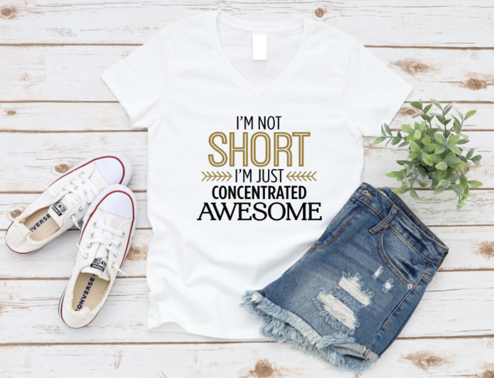 White t-shirt with humorous text, denim shorts, and white sneakers on a wooden surface. www.missmafia.com
