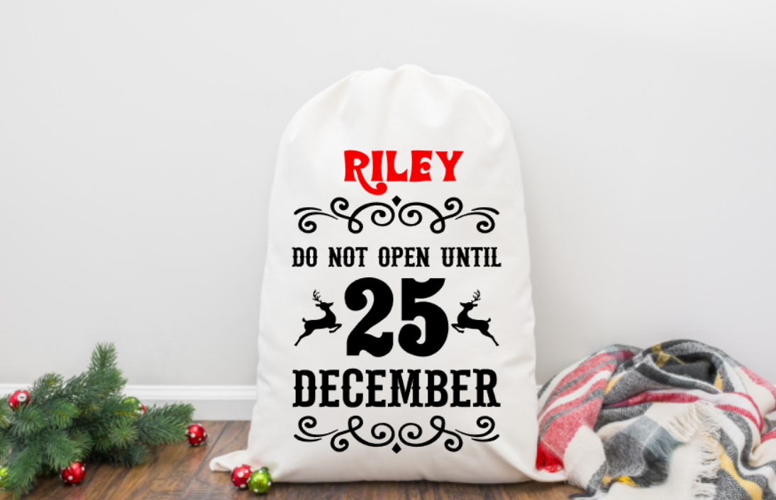 Personalized Christmas sack with 'RILEY DO NOT OPEN UNTIL 25 DECEMBER' text on a white background.