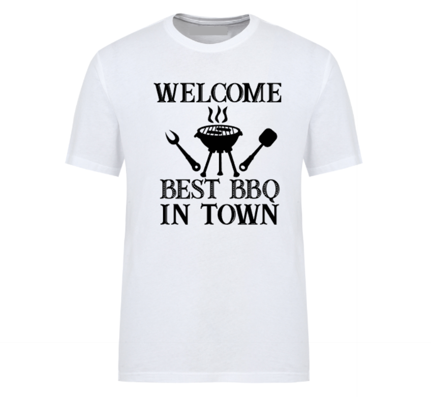 White t-shirt with bold black text reading “Welcome Best BBQ in Town,” featuring grilling utensils and a barbecue grill graphic – perfect for BBQ dads, weekend warriors, and summer cookout kings.