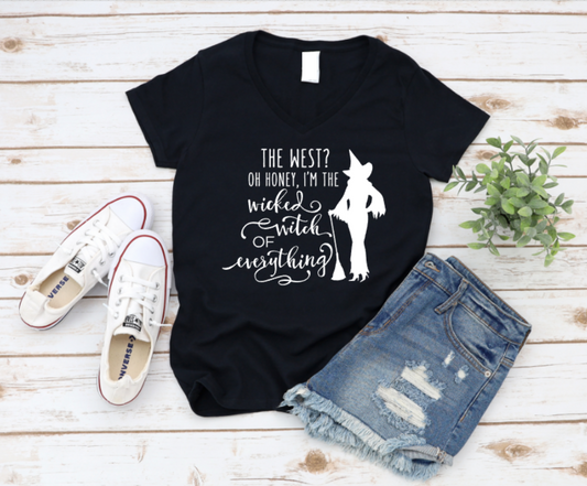 Black t-shirt with a graphic and text, paired with denim shorts and white sneakers on a wooden surface. www.missmafia.com