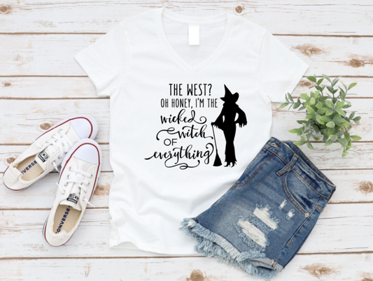 White t-shirt with a graphic and text, paired with denim shorts and white sneakers on a wooden surface. www.missmafia.com