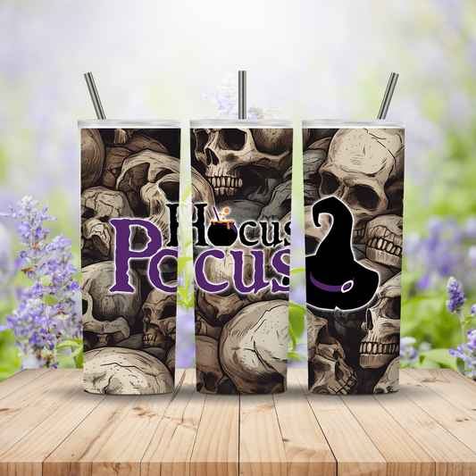 Skull-themed product with 'Hocus Pocus' text on a wooden surface with blurred floral background Miss Mafia