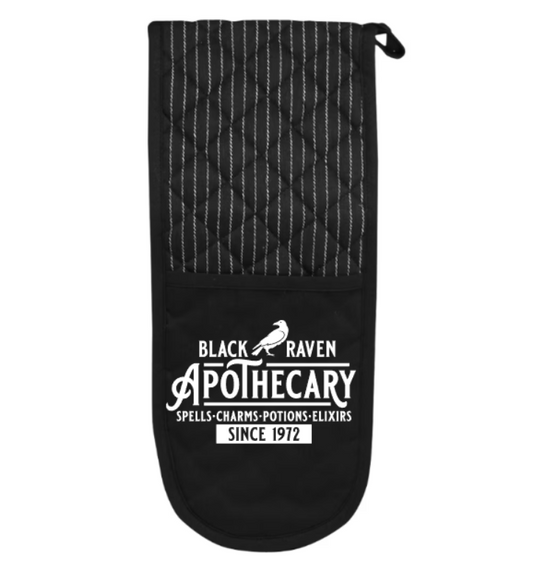 Black oven mitt with 'Black Raven Apothecary' text on a white background