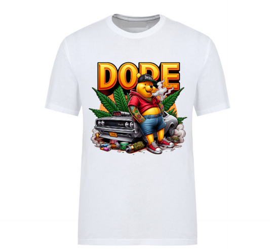 White t-shirt featuring a bold 'DOPE' graphic with a tattooed bear in streetwear, leaning against a muscle car surrounded by smoke, weed leaves, and urban details.