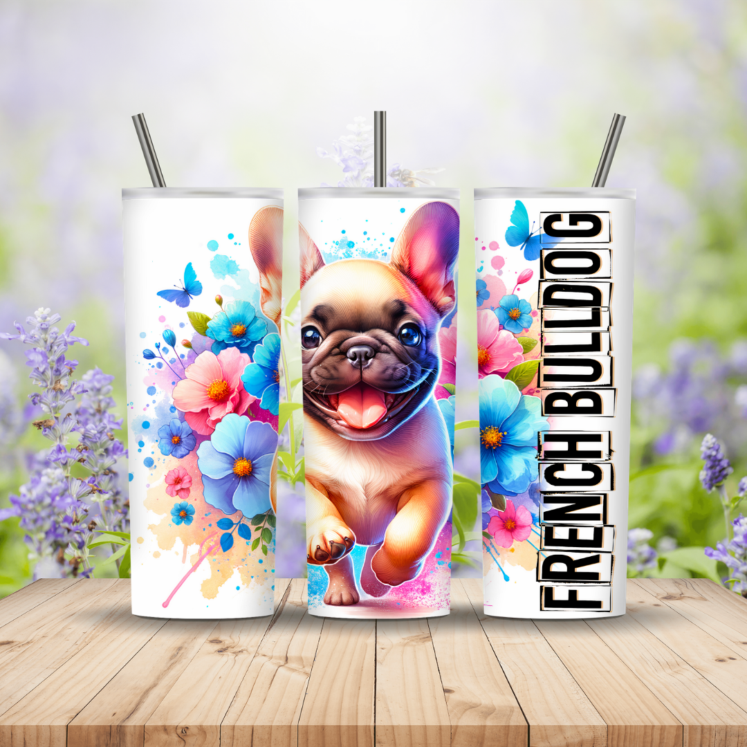 Three tumblers with a French Bulldog design on a wooden surface with a blurred floral background. Miss Mafia