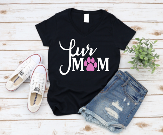 Black v-neck t-shirt with the phrase "Fur Mum" in white and a pink paw print in place of the "O", styled flat lay with denim shorts and white Converse sneakers.