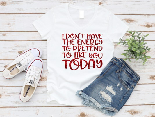 White unisex t-shirt with bold text reading “I Don’t Have the Energy to Pretend I Like You Today,” ideal for sarcastic, introverted, or no-nonsense moods