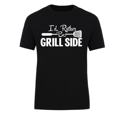 Unisex graphic t-shirt with the text “I’d Rather Be Grill-Side,” designed for BBQ lovers and backyard cooking kings.