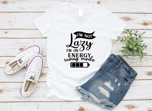 White sweatshirt with humorous text, white sneakers, and denim shorts on a wooden surface. www.missmafia.com