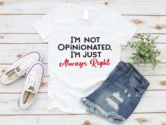 White t-shirt with text, blue jeans, and white sneakers on a wooden surface. www.missmafia.com