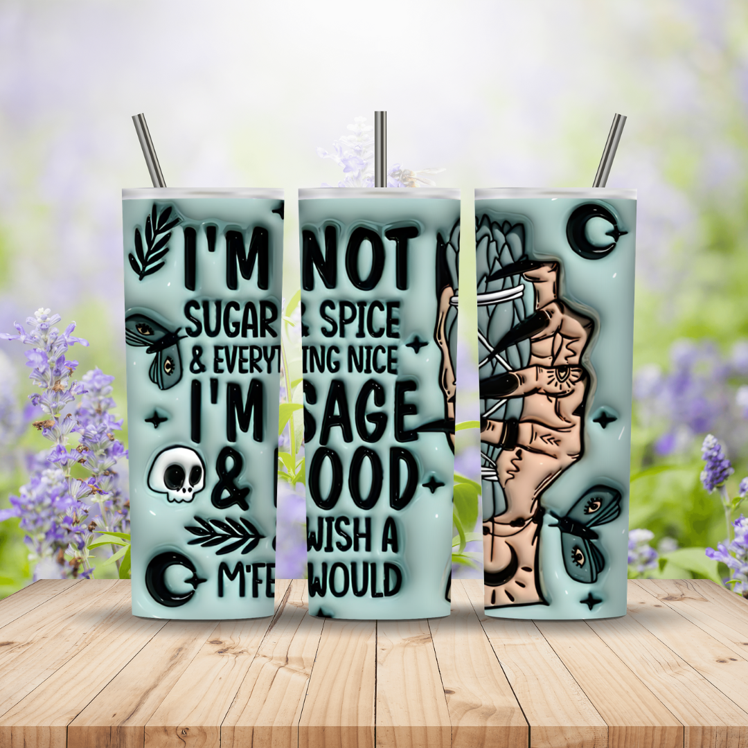 Three tumblers with unique designs and text on a wooden surface with a blurred floral background.