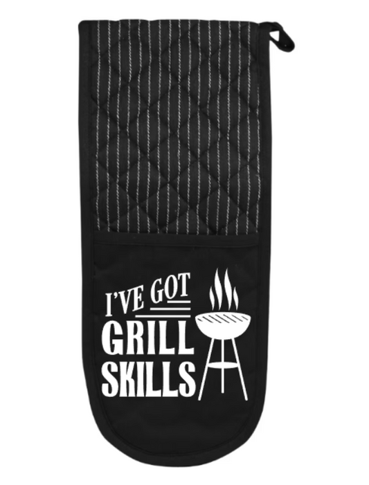 Black oven mitt with 'I've Got Grill Skills' text and grill icon on a white background