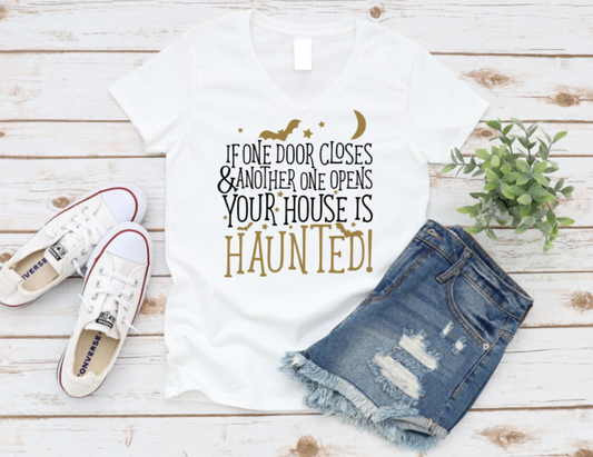 T-shirt with humorous text, white sneakers, and denim shorts on a wooden surface. www.missmafia.com