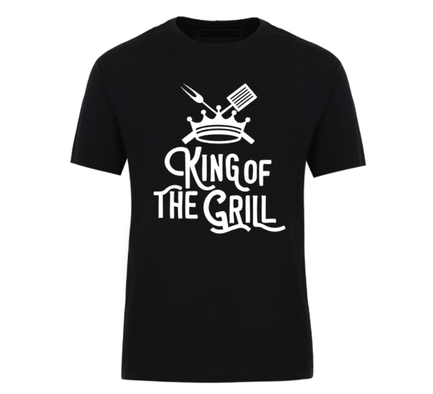 Black t-shirt with "King of the Grill" text design, featuring a crown, spatula, and meat fork – perfect for BBQ dads and grill masters.