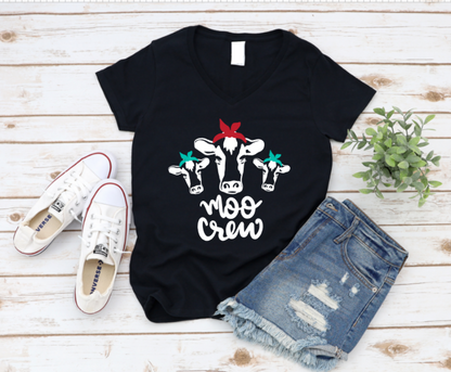 Black t-shirt with 'moo crew' design, white sneakers, and denim shorts on a wooden surface. www.missmafia.com