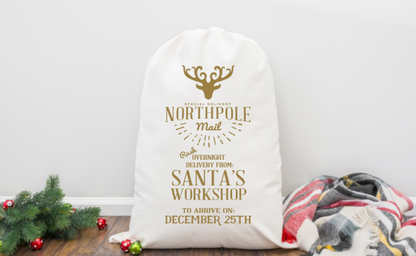 White sack with 'Northpole Mail' text and Christmas decorations on a white background