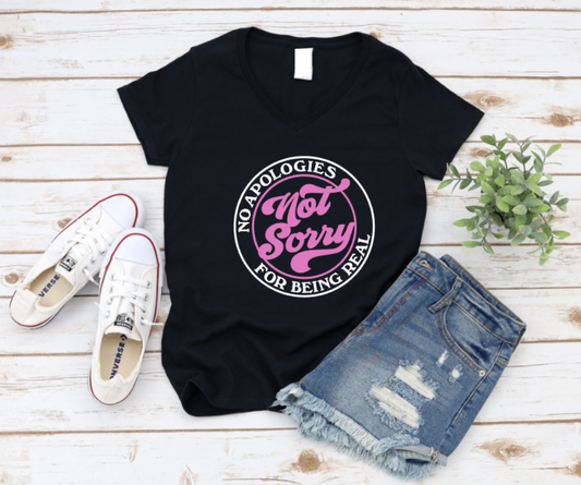 Black t-shirt with pink and white text on a wooden surface with shoes and shorts. WWW.MISSMAFIA.COM