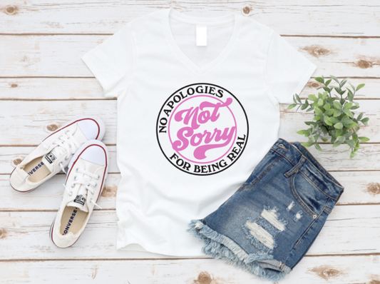 White t-shirt with pink and black text, white sneakers, and denim shorts on a wooden surface. www.missmafia.com