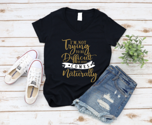 Black t-shirt with humorous text design, paired with denim shorts and white sneakers on a wooden surface. www.missmafia.com