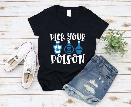 Black t-shirt with 'Pick Your Poison' text and bottles design, paired with denim shorts and white sneakers on a wooden surface. www.missmafia.com