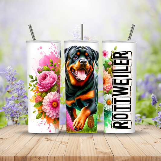 Three tumblers with floral designs, a Rottweiler, and personalized text on a wooden surface with a blurred floral background. Miss Mafia