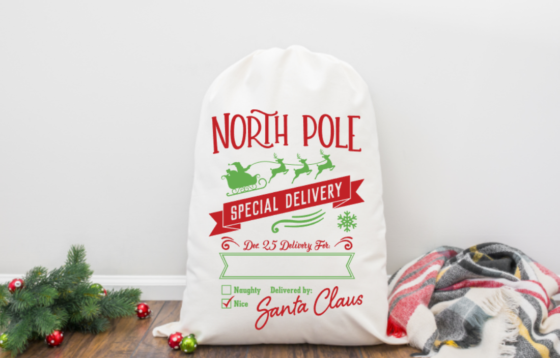 White sack with 'North Pole Special Delivery' text and graphics on a white background