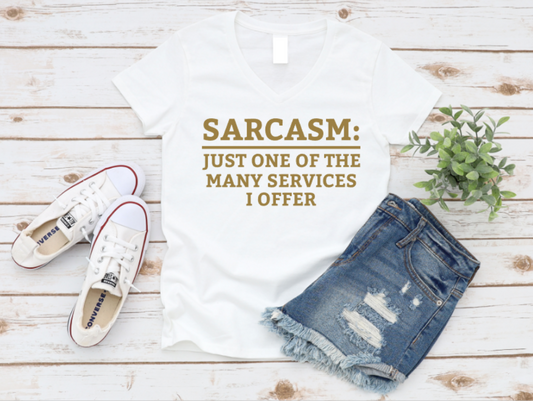 White t-shirt with humorous text, denim shorts, and white sneakers on a wooden surface. www.missmafia.com