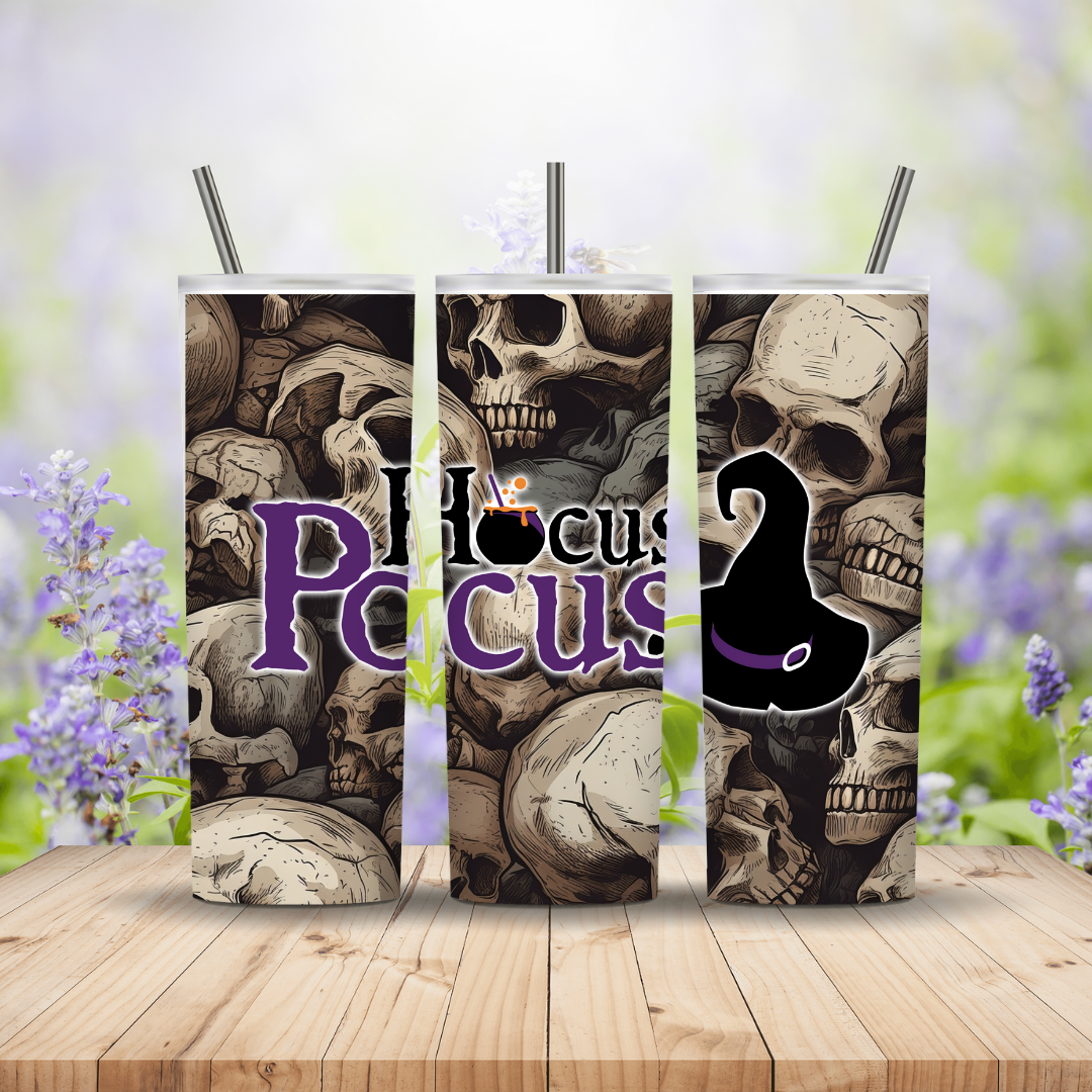 Skull-themed product with 'Hocus Pocus' text on a wooden surface with blurred floral background Miss Mafia