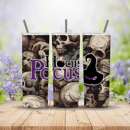 Skull-themed product with 'Hocus Pocus' text on a wooden surface with blurred floral background Miss Mafia