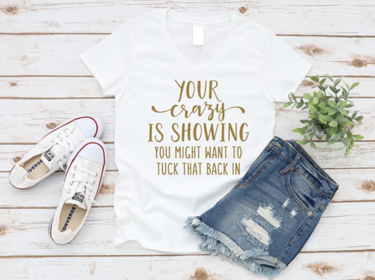 T-shirt with humorous text, white sneakers, and denim shorts on a wooden surface. www.missmafia.com