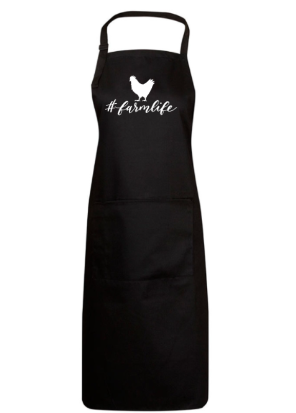 Black apron with '#farmlife' and a chicken graphic on a white background