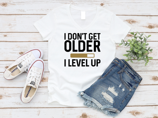 I Don’t Get Older, I Level Up White Shirt | V-Neck or Crew Neck