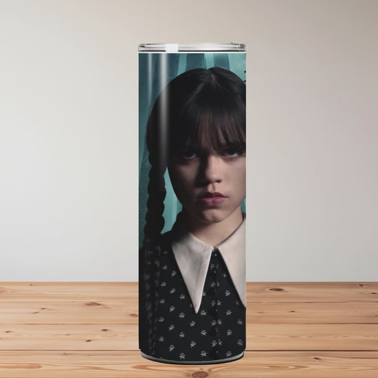 Tumbler with a design of a character from a movie or TV show on a wooden surface Miss Mafia