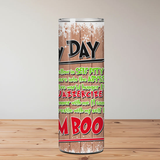 Funny Christmas tumbler with sarcastic holiday schedule, rustic wood background, and snowflake design. Features 20oz stainless steel cup with lid and straw.