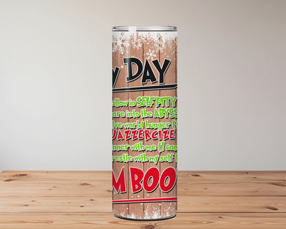 Funny Christmas tumbler with sarcastic holiday schedule, rustic wood background, and snowflake design. Features 20oz stainless steel cup with lid and straw.