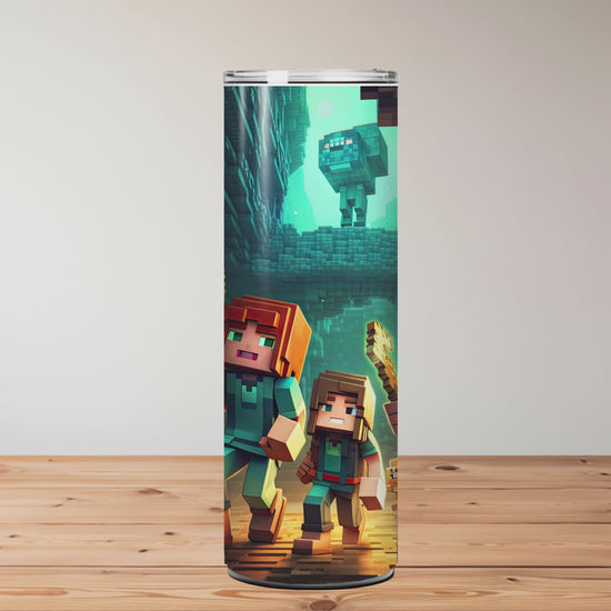 Tumbler with Minecraft-themed designs on a wooden surface Miss Mafia