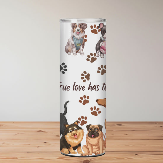 Tumblers with dog illustrations and paw prints on a wooden surface Miss Mafia