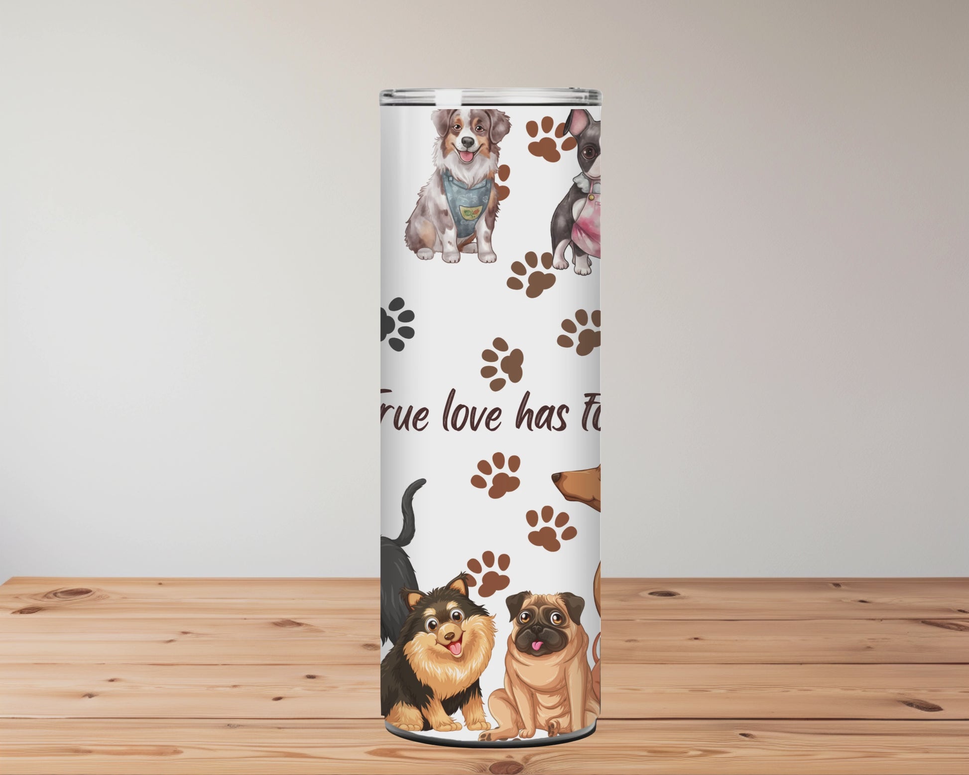 Tumblers with dog illustrations and paw prints on a wooden surface Miss Mafia