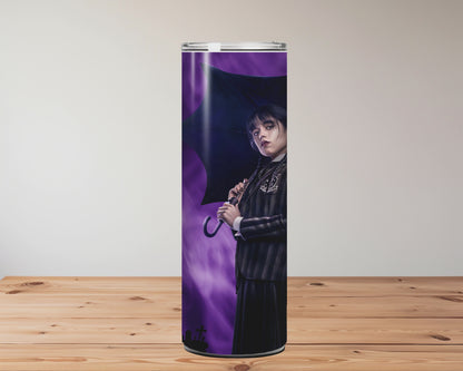 Tumbler with Halloween-themed designs on a wooden surface Miss Mafia