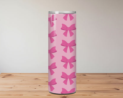 Tumblers with bow pattern on a wooden surface Miss Mafia