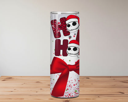 This sublimation tumbler features Santa-hat skulls, “Ho Ho Ho” text, a red bow, and festive confetti – a perfect goth-meets-Christmas 20oz cup.