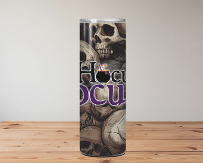Skull-themed product with 'Hocus Pocus' text on a wooden surface background Miss Mafia