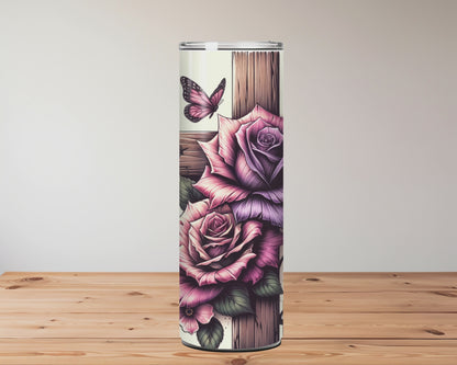 Tumbler with floral designs and text on a wooden surface Miss Mafia