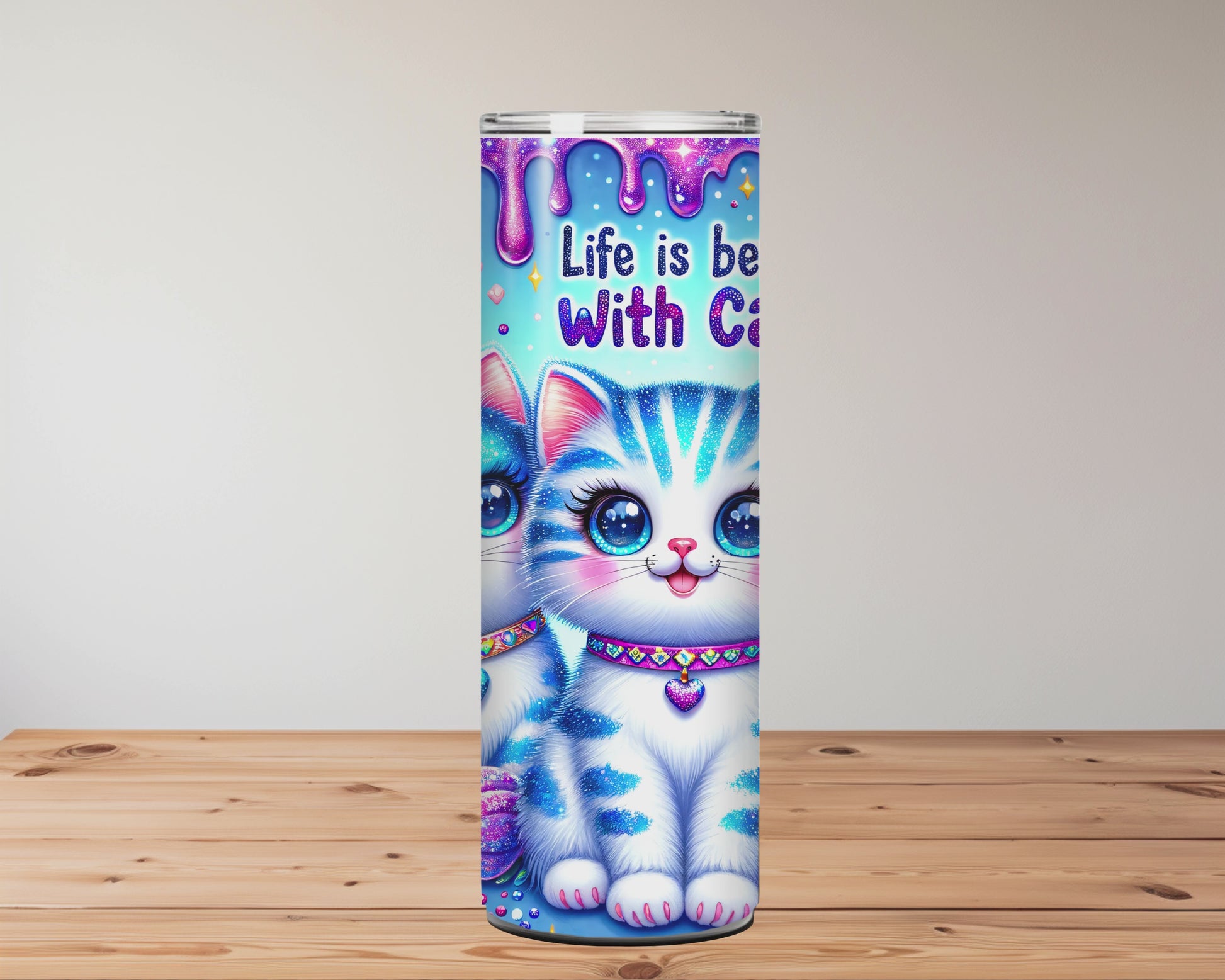 Colourful tumbler with cartoon cats on a wooden surface  Miss Mafia